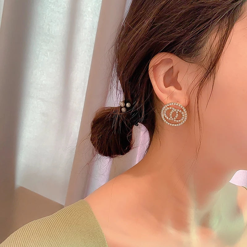 Zelvyn Glam Circle Stud Earrings – Gold & Crystal Accents