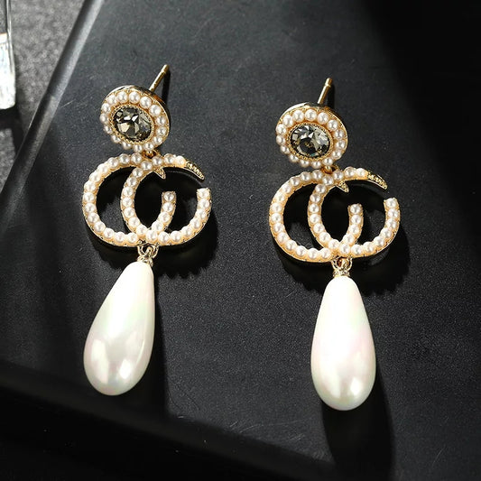 Pearl Drop Statement Earrings with Gold & Crystal Detailing – Zelvyn
