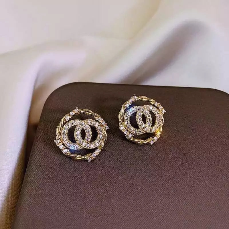 Gold-Tone Twisted Circle Crystal Stud Earrings – Zelvyn