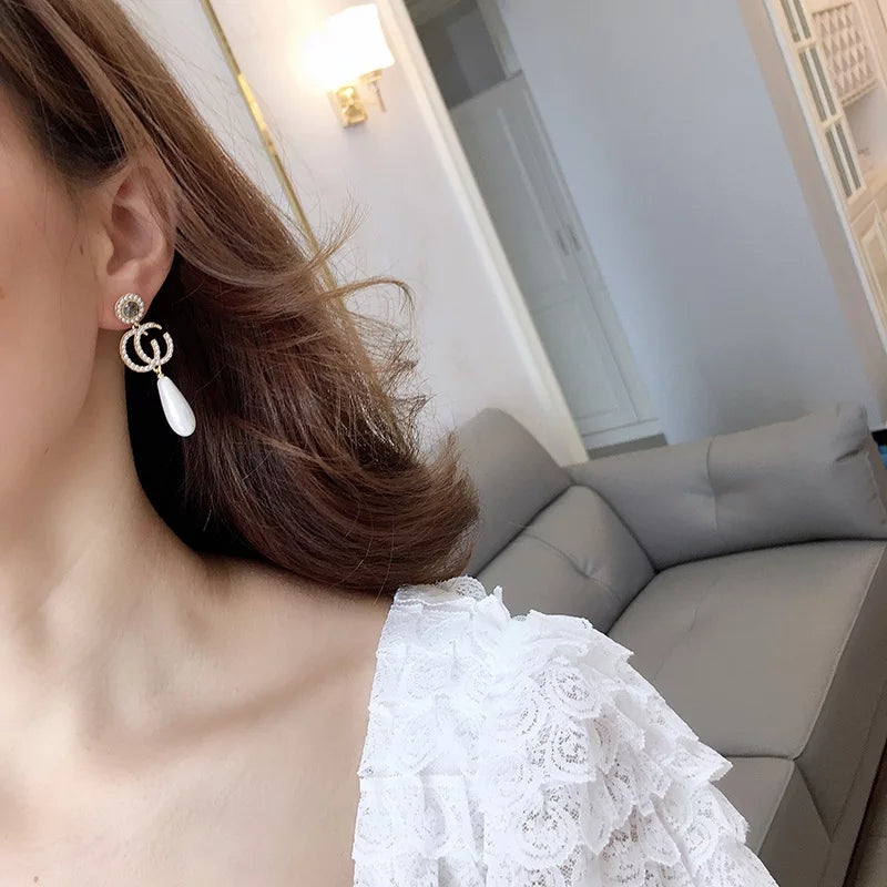 Pearl Drop Statement Earrings with Gold & Crystal Detailing – Zelvyn