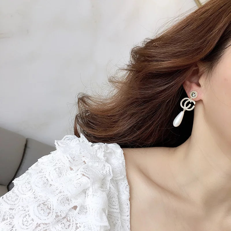 Pearl Drop Statement Earrings with Gold & Crystal Detailing – Zelvyn